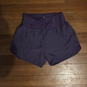 Purple athlete shorts